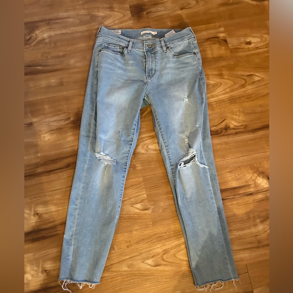 Levi’s semi distressed denim jeans
